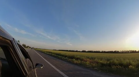 View from the car window while driving Stock Photos