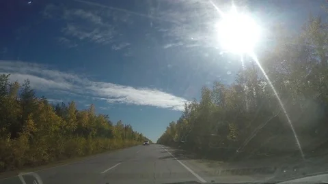 View from Car windshield. Road Trip on Suburban Road Stock Footage 70080025