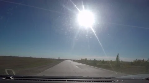 View from Car windshield. Road Trip on Suburban Road Stock Footage 70211959