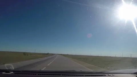 View from Car windshield. Road Trip on Suburban Road Stock Footage 70247046