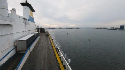 View from a cargo ferry deck with semi trailer sailing on the river canal in Ros Stock Footage 335638913
