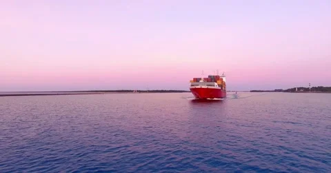 View of a cargo ship in a beautiful ocean.  Stock Footage 57137261