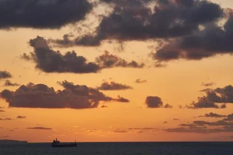 View of the cargo ship at twilight in Biscay Bay, Port of Bilbao Stock-Fotos