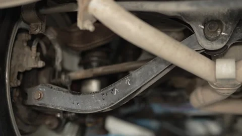 A view of a car's multi-link rear suspension assembly Stock Footage 340978103