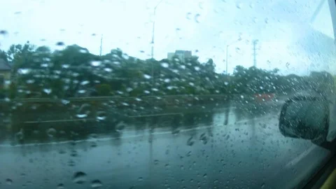 View from car's window when rainy at highway Stock Footage