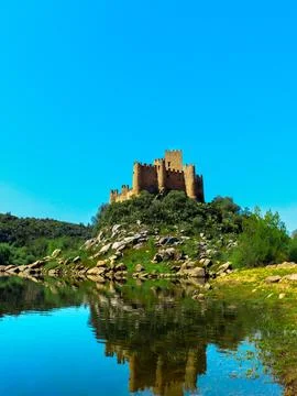 View of Castle Reflected in Water Stock Photos