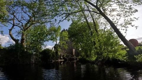 View of a castle from the river Stock Footage 243595427