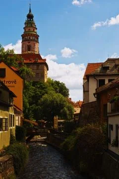 View on castle tower of Cesky Krumlov covered by antique paintings from the b Stock Photos