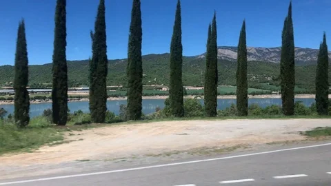 View of Catalonian nature from window of bus going from Barcelona to Andorra Stock Footage 107922477