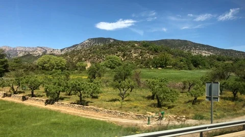 View of Catalonian nature from window of bus going from Barcelona to Andorra Stock Footage 107922728