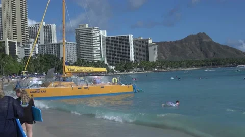 View Of Catamaran Boat With Diamond Head On Waikiki Beach, Honolulu, Hawaii Stock Footage 154356346