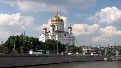 View on Cathedral of Nativity of Christ. Buses are parked along embankment. Video stock 106370216