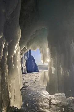 View from the cave covered with ice Stock Photos