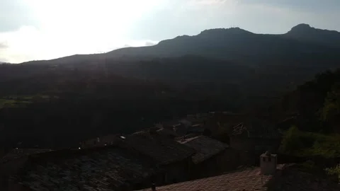 View of a cave house wall with a drone Stock Footage 126899422