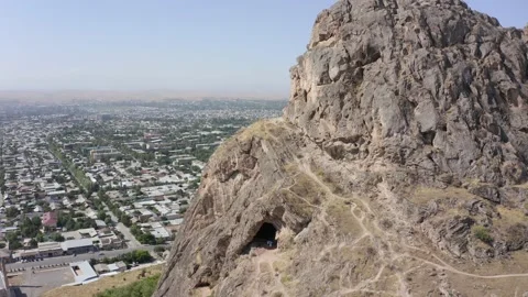 View of the cave of one of the peaks of the mountain Sulaiman-Too 動画素材 210186153