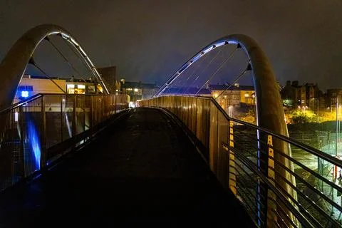 A view of Celtic Gateway bridge, a stainless steel pedestrian and cycle bridg Stock Photos