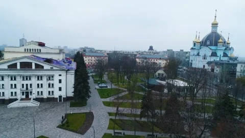View of the central square and reconstruction of the Drama Theater of Mariupol Stock Footage 280389308