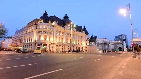 View of Central University Library and Carol I statue at dusk, Romania. 動画素材 335600793