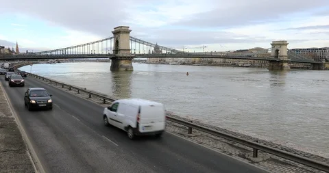 A view of Chain Bridge on Danube river and city traffic Stock Footage 102229551