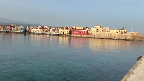 View of Chania with the amazing lighthouse, mosque, venetian shipyards, Crete, Stock Footage 276334899
