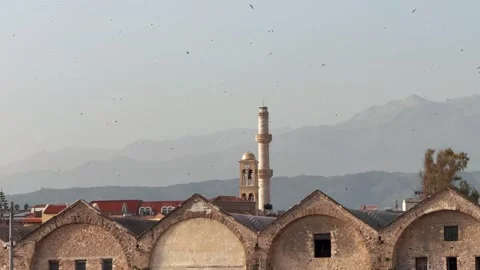 View of Chania with the amazing lighthouse, mosque, venetian shipyards, Stock Footage 276953225
