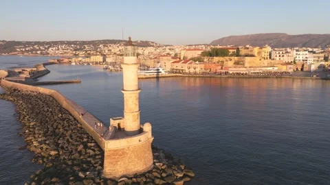 View of Chania with the amazing lighthouse, mosque, venetian shipyards, Crete,  Stock Footage 310746231