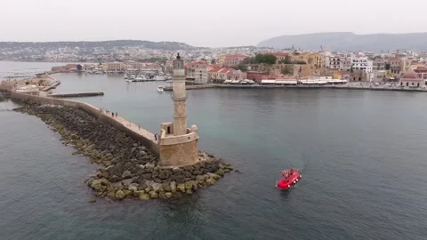  View of Chania with the amazing lighthouse, mosque, venetian shipyards, Crete,  Stock Footage 330006803