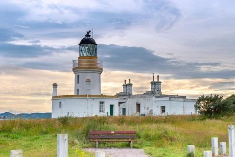 View of Chanonry Point Lighthouse at sunset in summer in Higlands of Scotland. Stock Photos