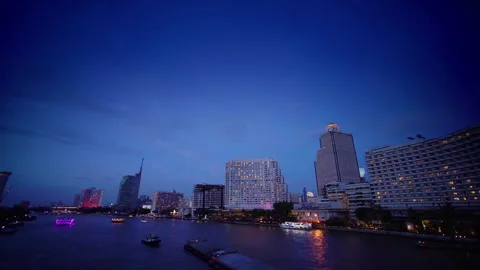 View of the Chao Phraya River and Bangkok City at night Stock Footage 247593307
