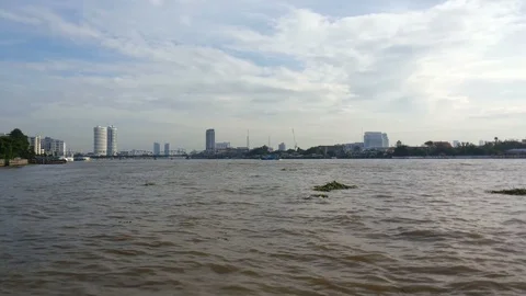 View of Chao Phraya river with Krung Thon bridge from on the pier in Bangkok Stock Footage 101368536
