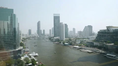 View of Chaophraya River with skyscraper in the city of bangkok in daytime Stock Footage 200776962