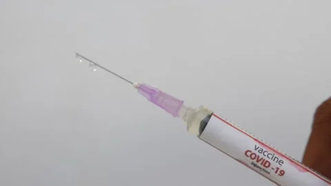View of checking covid-19 vaccine injection, Coronavirus vaccine fiiled in in Stock Footage 147697400