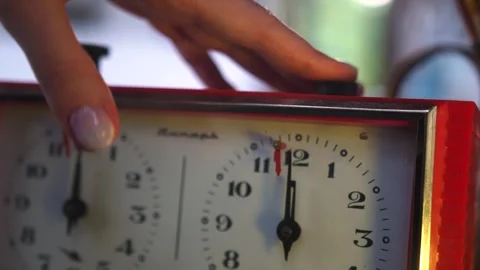 View of chess clock. Vintage chess timer. Player's hand presses on button Video stock 246972874