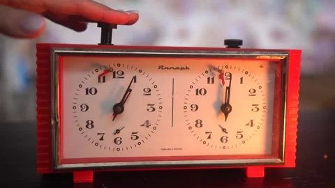View of chess clock. Vintage chess timer. Player's hand presses on button Video stock 246972882