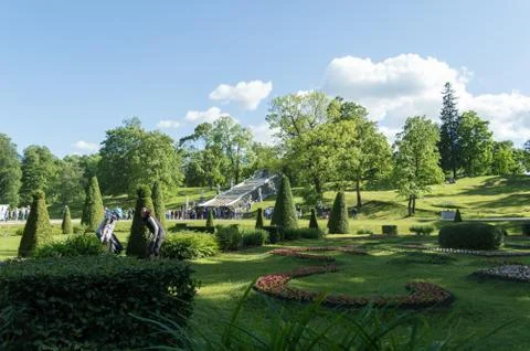 A view of the Chess Mountain cascade and surriunding park in a summer sunny d Stock Photos