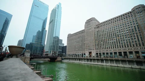 View of Chicago green colored river in the city center on St Patrick day Stock Footage 323456258