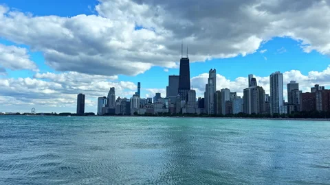 View of Chicago skyline with clouds and water on a clear day Stock Footage 341374528