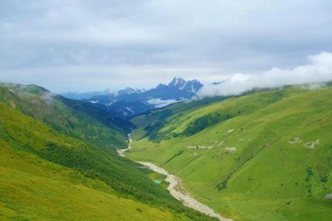 View from Chkhunderi mountain pass to valley and Khaldechala river in the sum Stock Photos