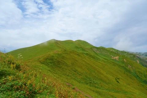 View from Chkhunderi mountain pass to valley and Khaldechala river in the sum Stock Photos