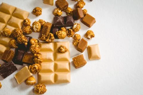 View of chocolates over white background Stock Photos