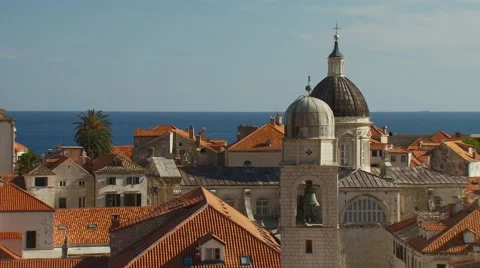 View of church bell tower and house roof in Croatia Stock Footage 60691053