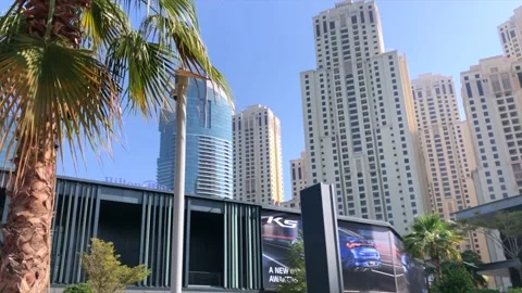 View on cinema in JBR with palm on foreground 動画素材 144428680