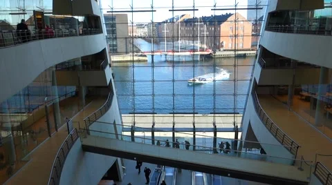 View of the Circle Bridge and a swerving canal tour boat from the Black Diamond Video stock 61345112