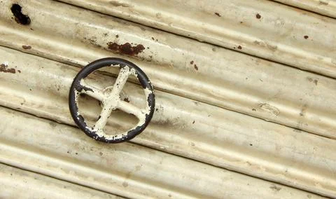 View of circular handle of metal roller shutter door Stock Photos