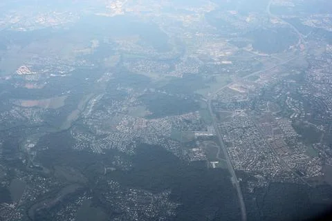A view of cities from an airplane. Stock Photos