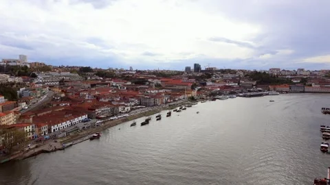 View of cities of Vila Nova de Gaia and Porto in Douro River. Urban landscape. Stock Footage 309109465