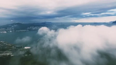 View of the city from above the clouds Stock Footage 222392546