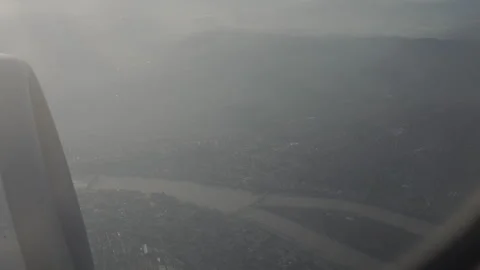 View of the city from the airplane window. Stock Footage 306461398