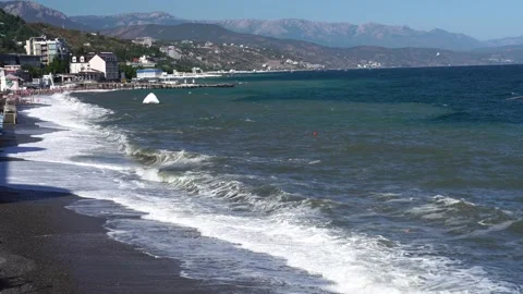 View of city beach and surrounding mountains Stock Footage 165814927