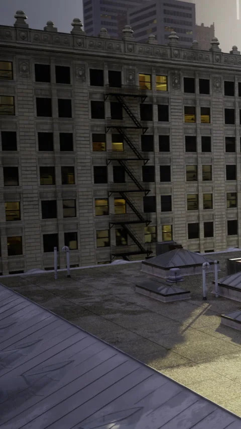 View of city building from rooftop at sunset with visible fire escape Stock Footage 336177742